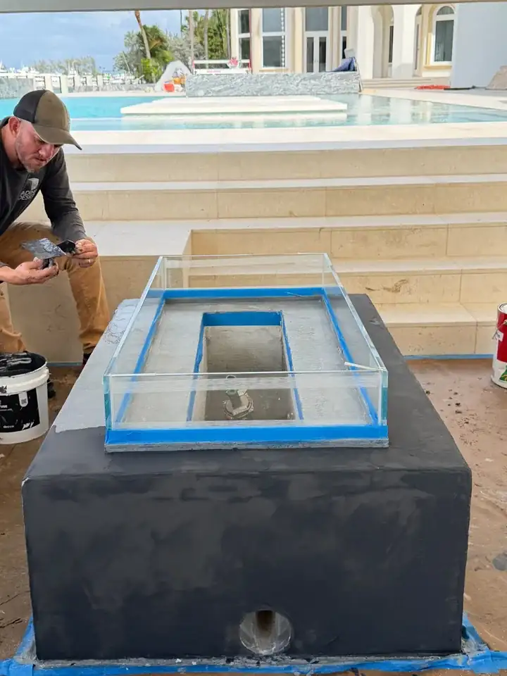 Fire feature during finishing — Microcement, masking & sealing, Fort Lauderdale, FL